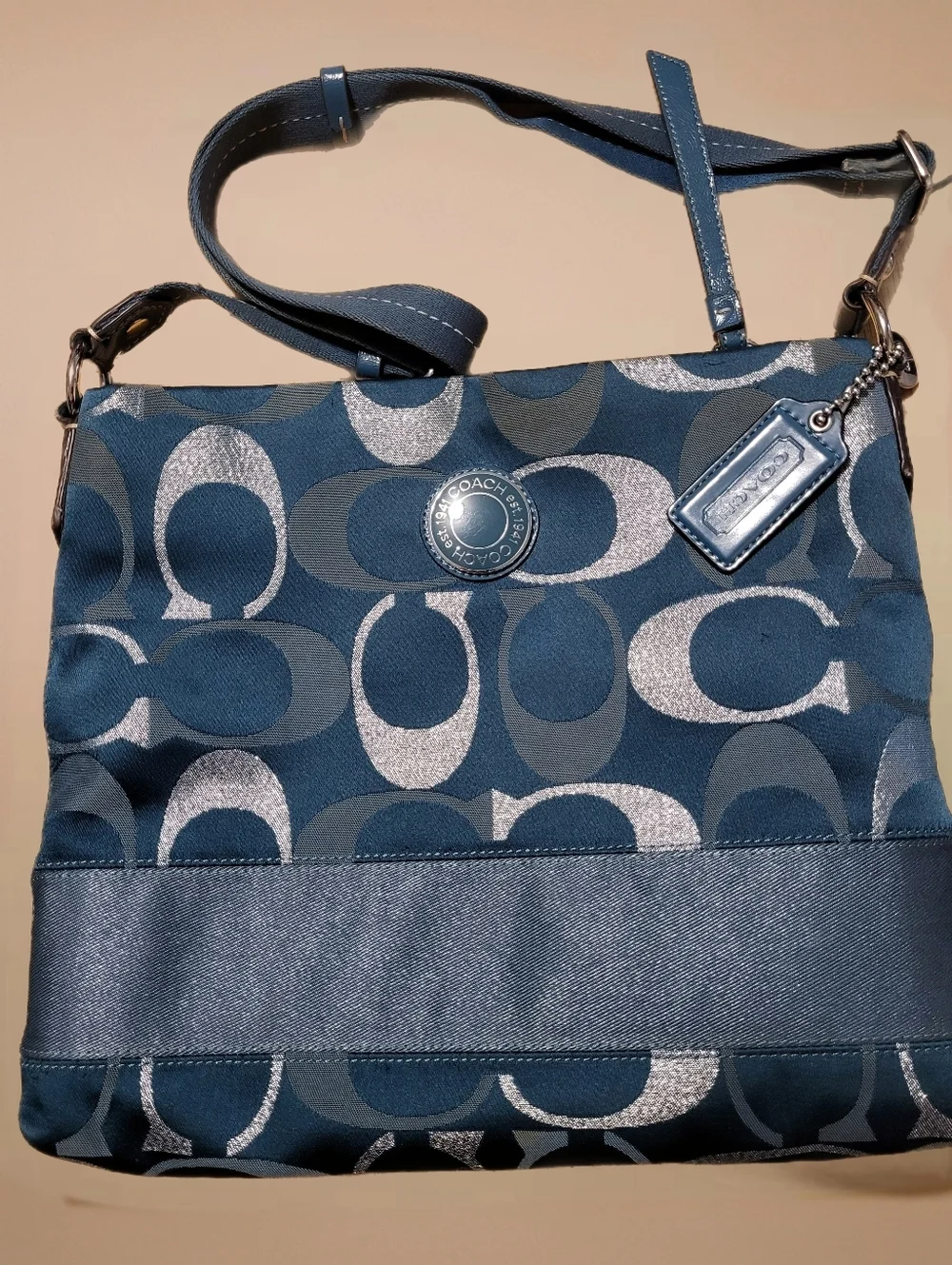 COACH SIGNATURE STRIPE FILE BAG. TEAL AND METALLIC SILVER.